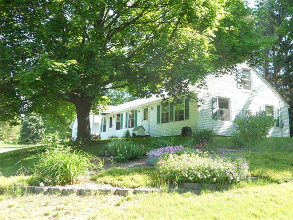 110 South Cross Road Gill, MA 01354 - Photo 1 of 1 a front view of a house with a yard