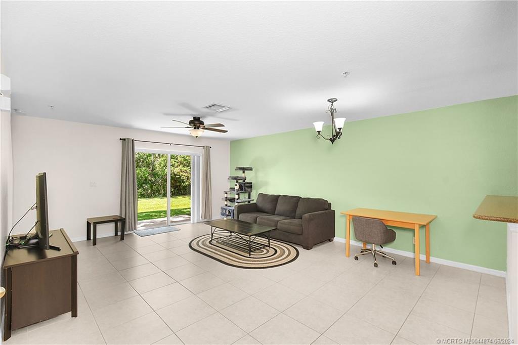 365 Southeast Bloxham Way Stuart, FL 34997 - Photo 4 of 27 a living room with furniture