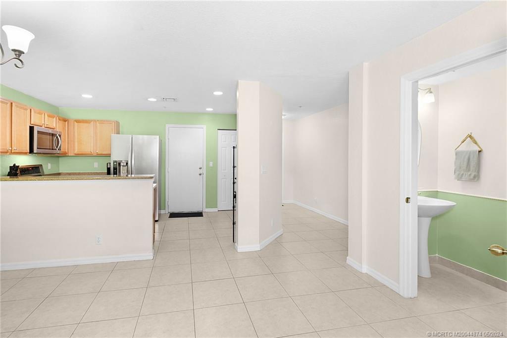 365 Southeast Bloxham Way Stuart, FL 34997 - Photo 9 of 27 a view of a kitchen with a sink