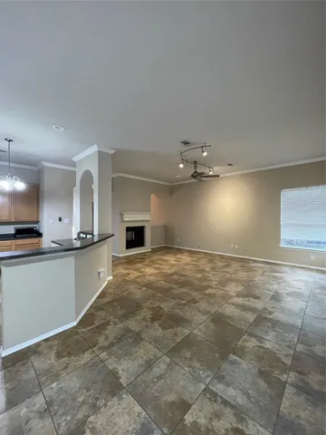 a view of a kitchen with a sink and a stove
