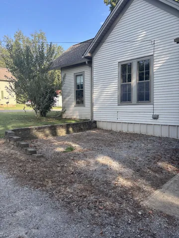 a front view of house with yard