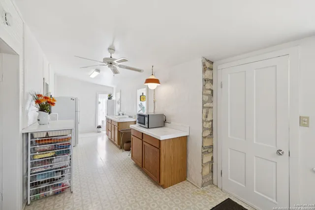 a view of a living room and utility room