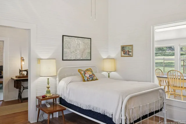 a view of a livingroom with furniture and windows