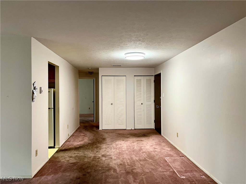 3068 Kent Road, Unit 105C Stow, OH 44224 - Photo 5 of 42 Dining area with coat closet and utility closet