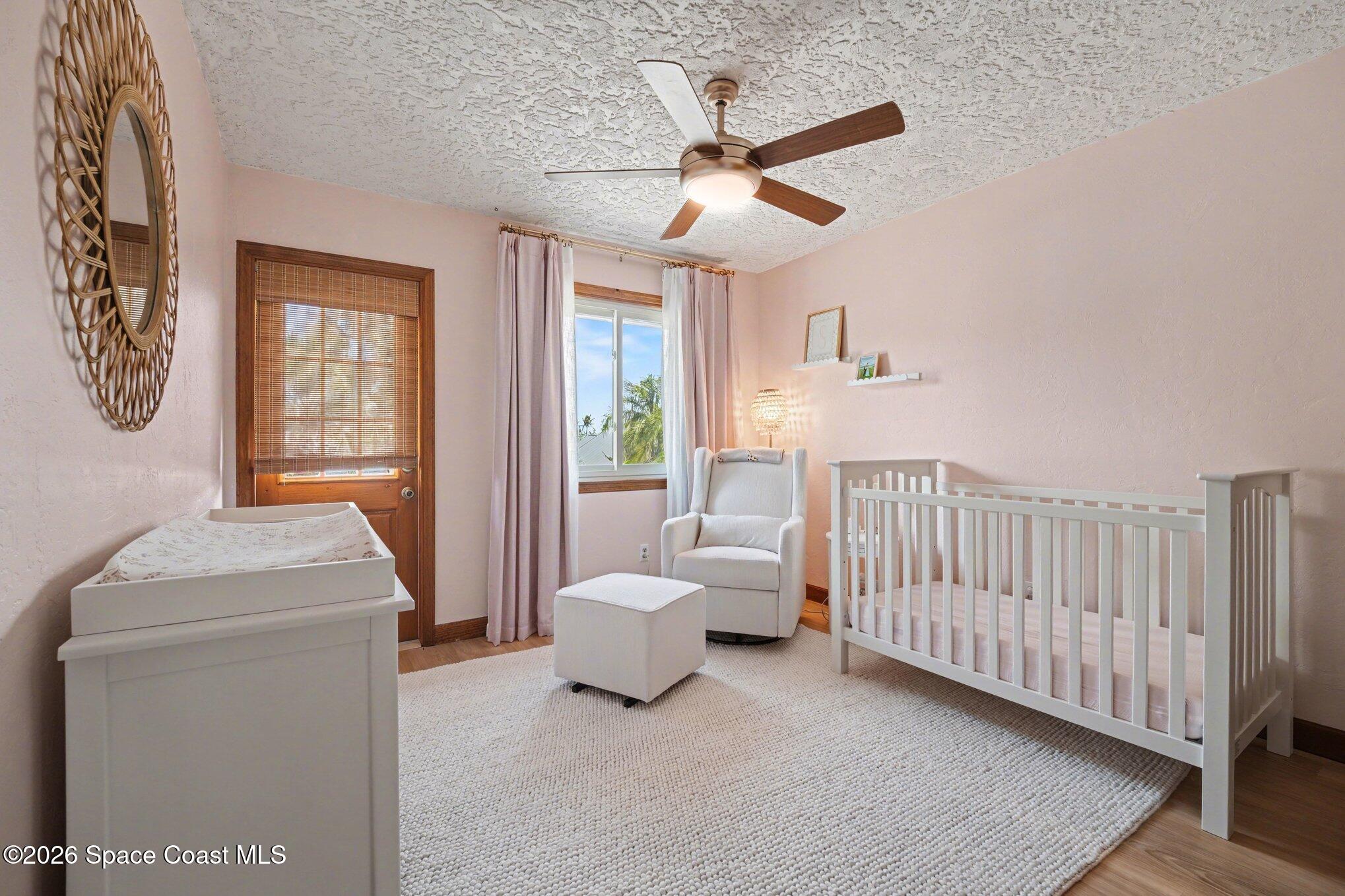 568 Rio Casa Drive North Indialantic, FL 32903 - Photo 21 of 45 a living room with furniture and white walls