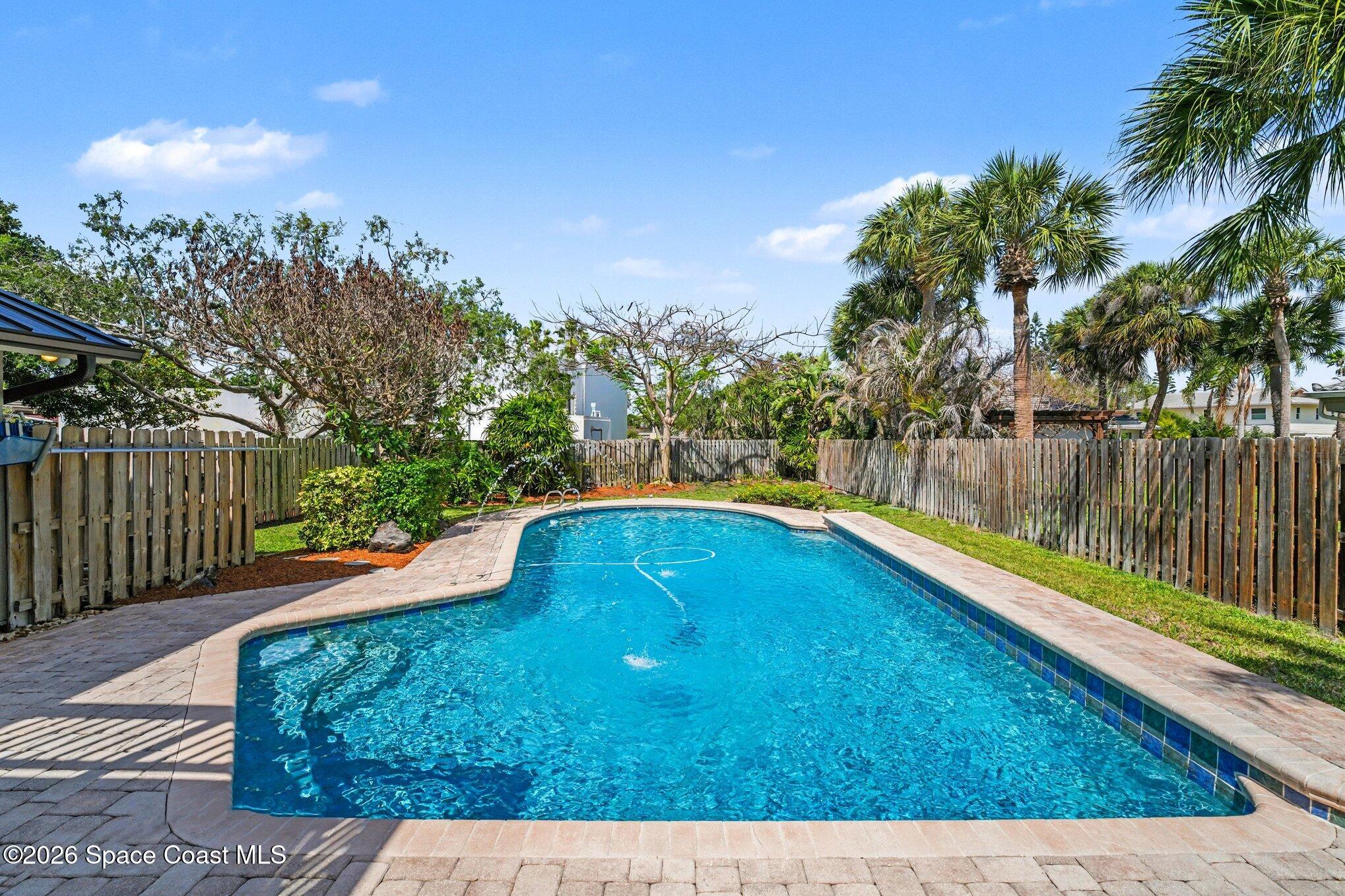 568 Rio Casa Drive North Indialantic, FL 32903 - Photo 3 of 45 a view of swimming pool with a yard