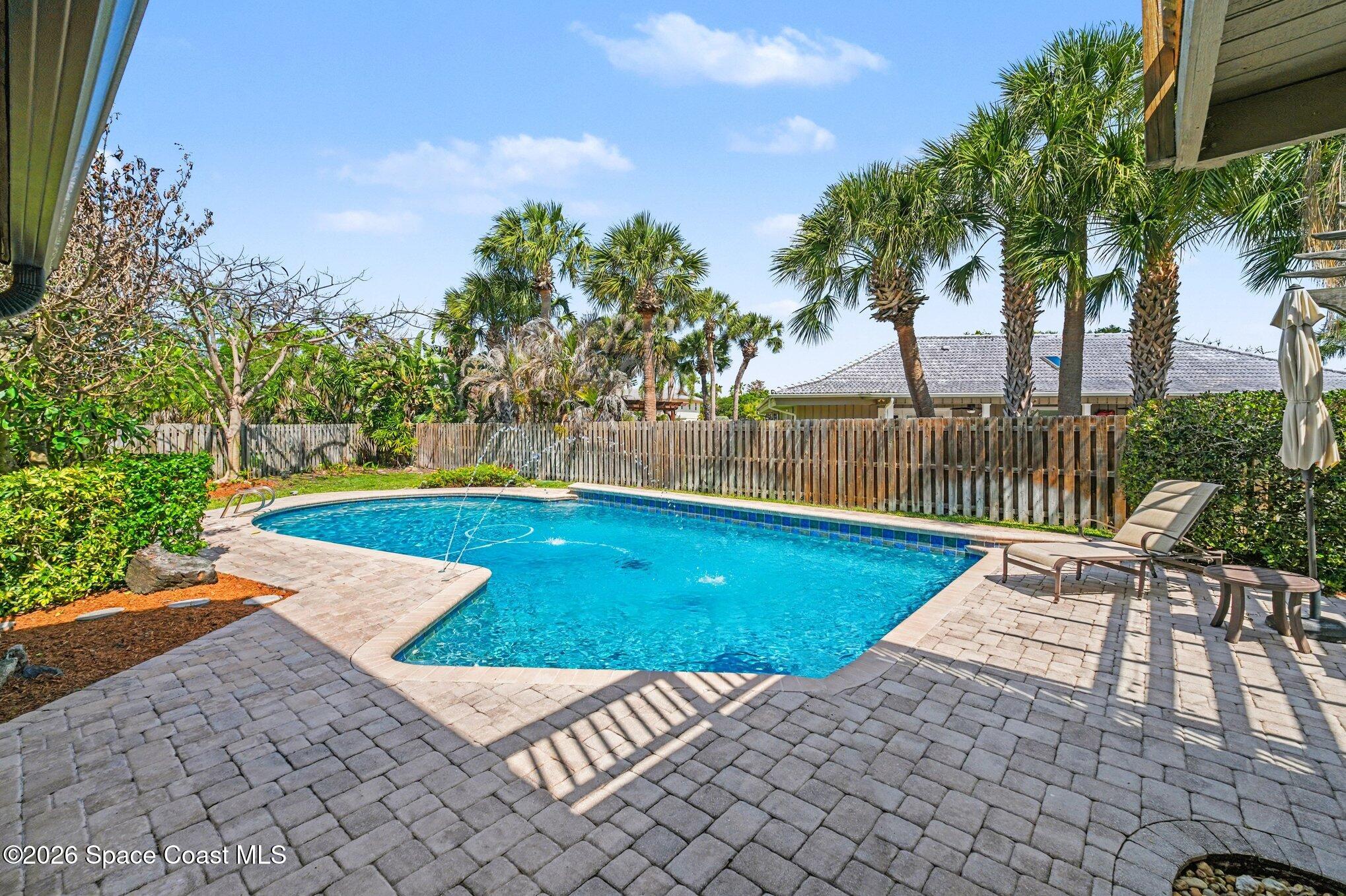 568 Rio Casa Drive North Indialantic, FL 32903 - Photo 34 of 45 a view of a backyard with a patio
