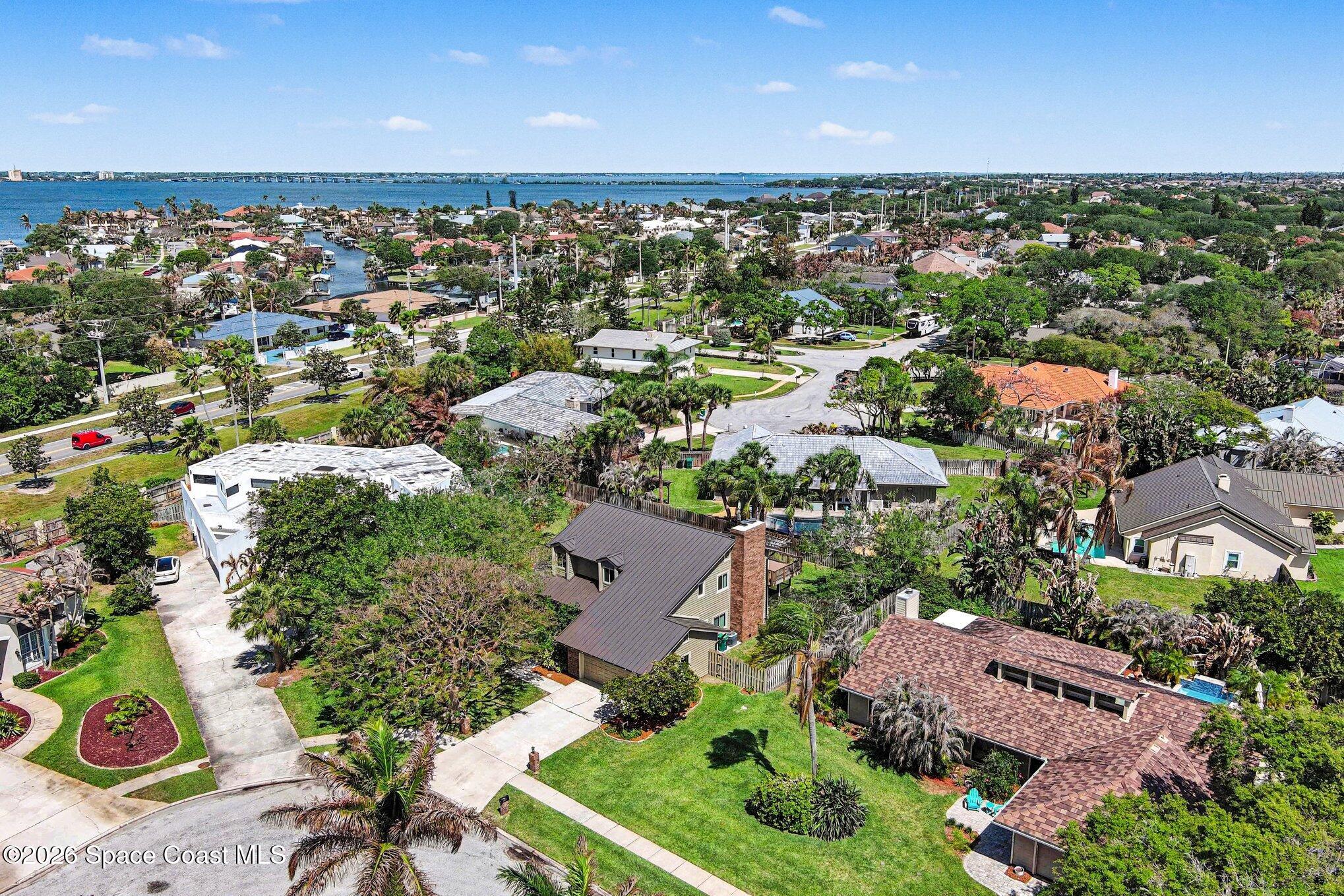 568 Rio Casa Drive North Indialantic, FL 32903 - Photo 40 of 45 an aerial view of residential houses with outdoor space and street view