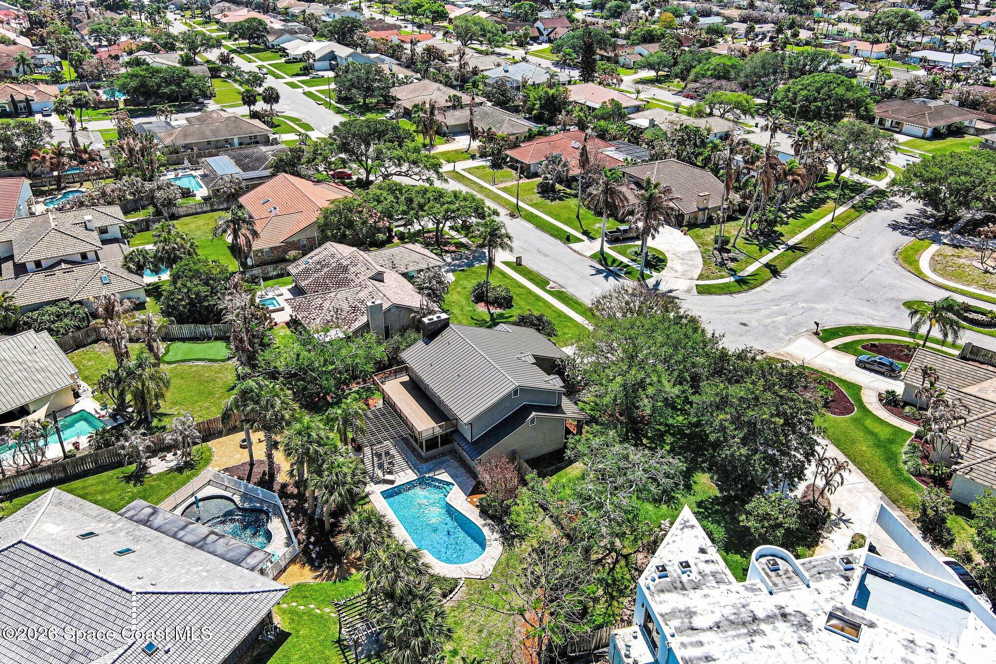 568 Rio Casa Drive North Indialantic, FL 32903 - Photo 43 of 45 an aerial view of residential houses with outdoor space