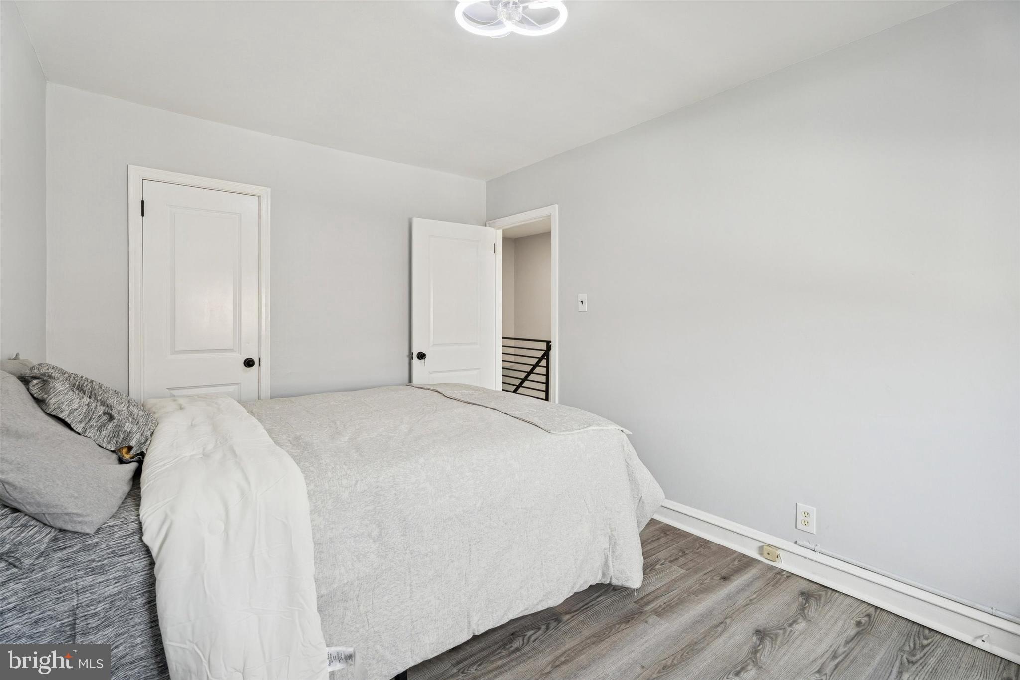 8259 Williams Avenue Philadelphia, PA 19150 - Photo 17 of 25 a bedroom with a bed and a white wall