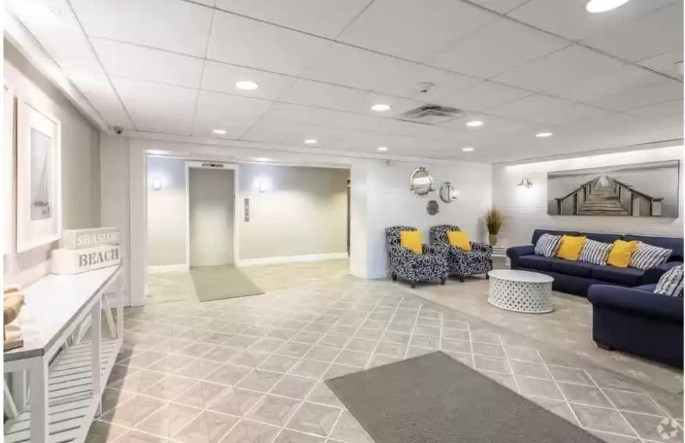 2 Ocean, Unit 402 Revere, MA 02151 - Photo 14 of 16 a living room with furniture and a couch