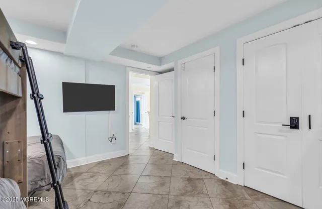 a bathroom with a shower and a bathtub