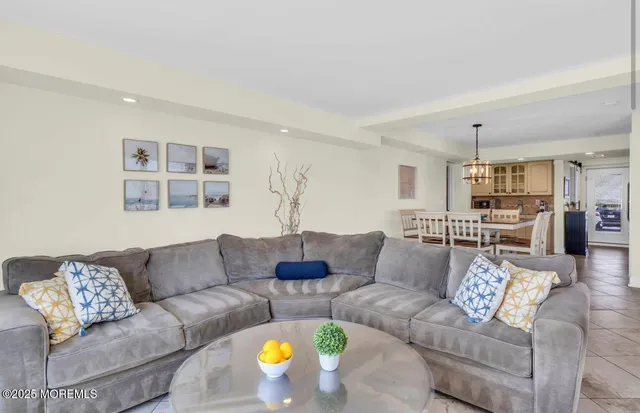 a bedroom with a bed and large window