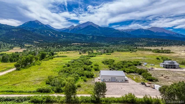 a view of a houses with a yard