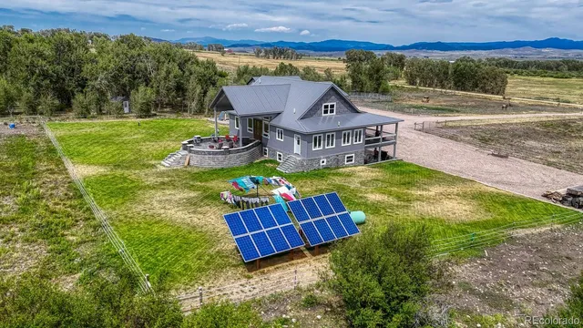 a view of a house with a big yard