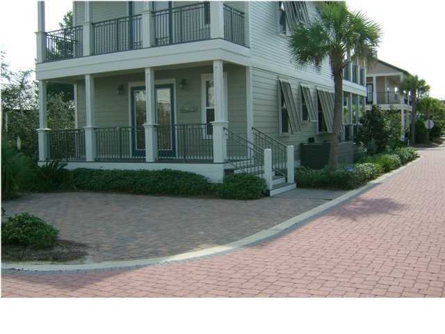 Lot 22 Seacrest Beach Blvd Inlet Beach Inlet Beach, FL 32461 - Photo 11 of 16 a view of a brick house with a yard