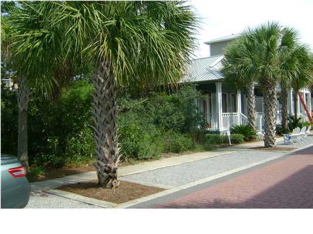 Lot 22 Seacrest Beach Blvd Inlet Beach Inlet Beach, FL 32461 - Photo 2 of 16 a black and white house with a yard