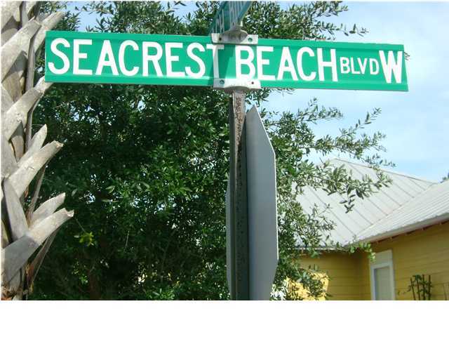 Lot 22 Seacrest Beach Blvd Inlet Beach Inlet Beach, FL 32461 - Photo 8 of 16 a street sign that is sitting on a wall