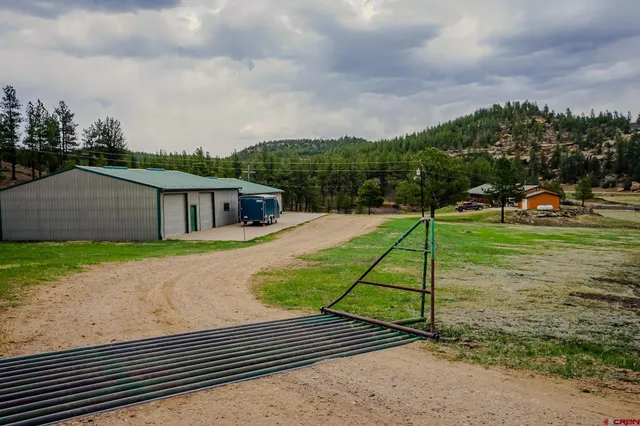 a house view with a backyard space
