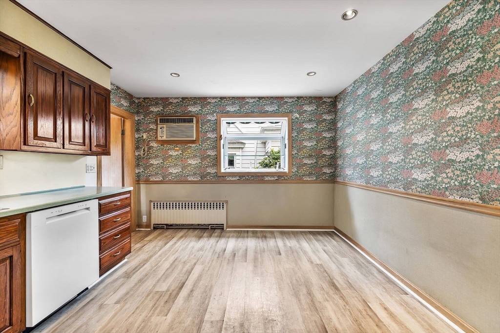 29 Undine Road Boston, MA 02135 - Photo 6 of 16 a view of a kitchen with wooden floor and electronic appliances