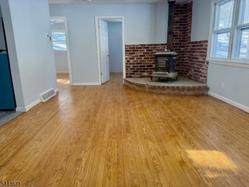 56 Appleseed Road Vernon, NJ 07461 - Photo 2 of 8 a view of empty room with stairs and ventilation