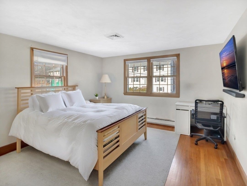 22 Susan Drive Saugus, MA 01906 - Photo 23 of 42 a bedroom with a bed and a flat screen tv