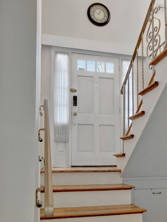22 Susan Drive Saugus, MA 01906 - Photo 4 of 42 a view of staircase with white walls and railing