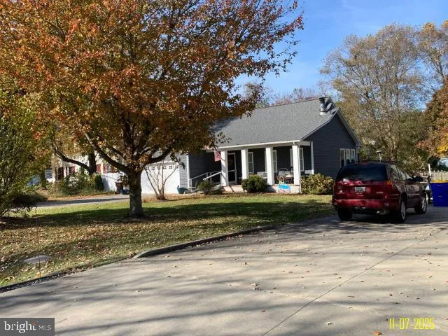 a house view with a garden space