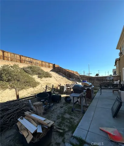 a view of a terrace with sitting area