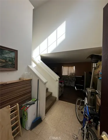 a view of room with window and furniture