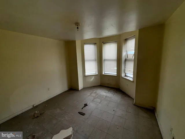 an empty room with windows