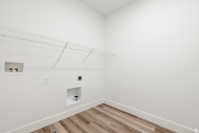 4653 South Alder Drive, Unit H304 Mapleton, UT 84664 - Photo 13 of 14 Laundry room with washer hookup, hookup for an electric dryer, and wood finished floors