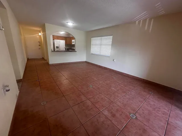 a view of a livingroom with wooden floor