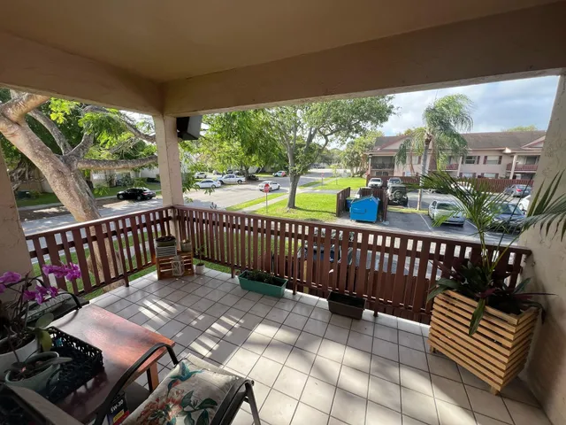 a view of a two chairs in the deck