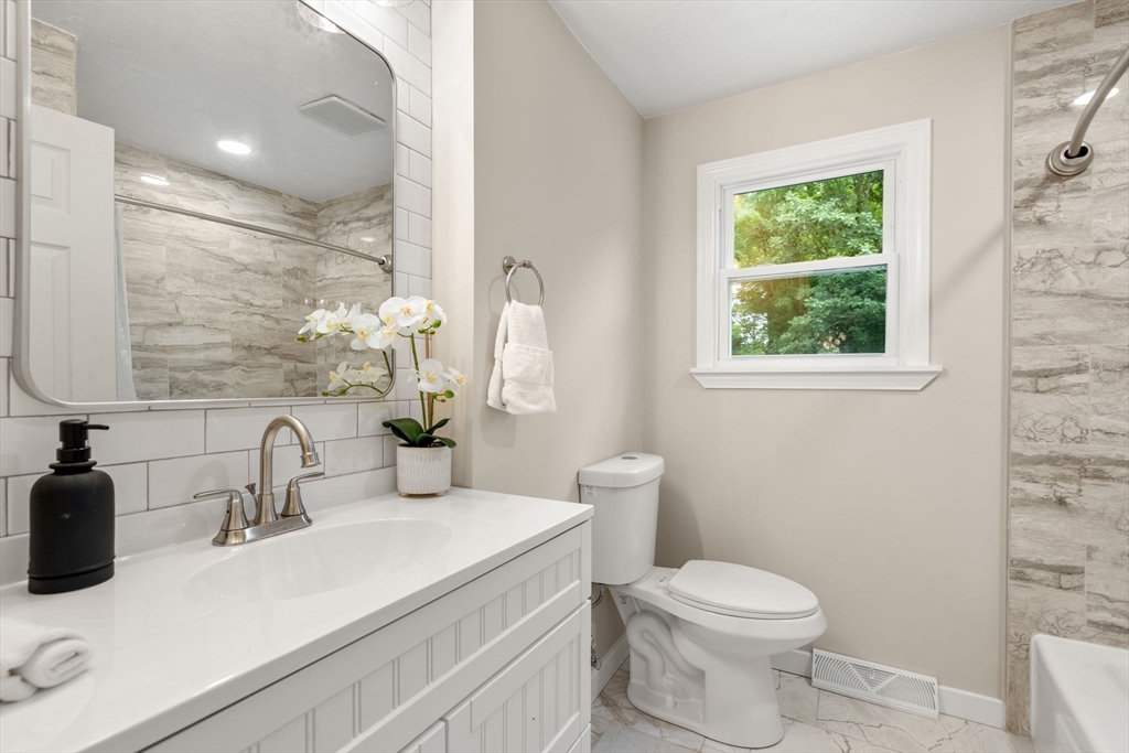 7 Prescott Road Sutton, MA 01588 - Photo 14 of 34 a bathroom with a sink toilet and a mirror
