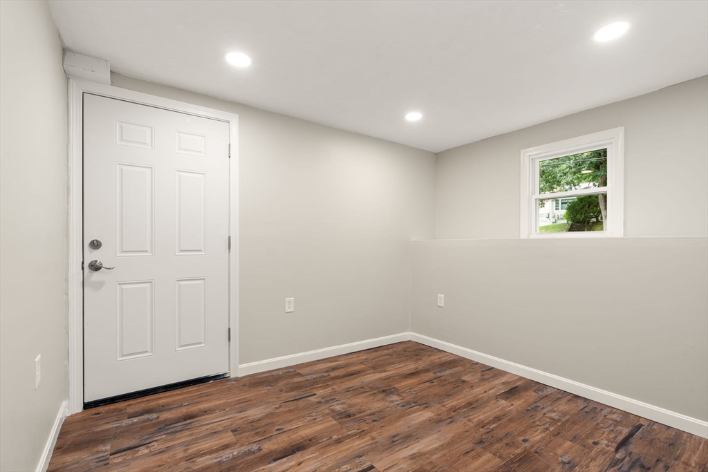 7 Prescott Road Sutton, MA 01588 - Photo 19 of 34 a view of empty room with wooden floor and fan