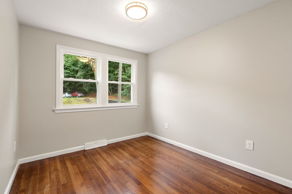7 Prescott Road Sutton, MA 01588 - Photo 22 of 34 wooden floor in an empty room with a window