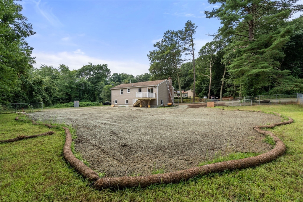 7 Prescott Road Sutton, MA 01588 - Photo 26 of 34 a backyard of a house with lots of green space