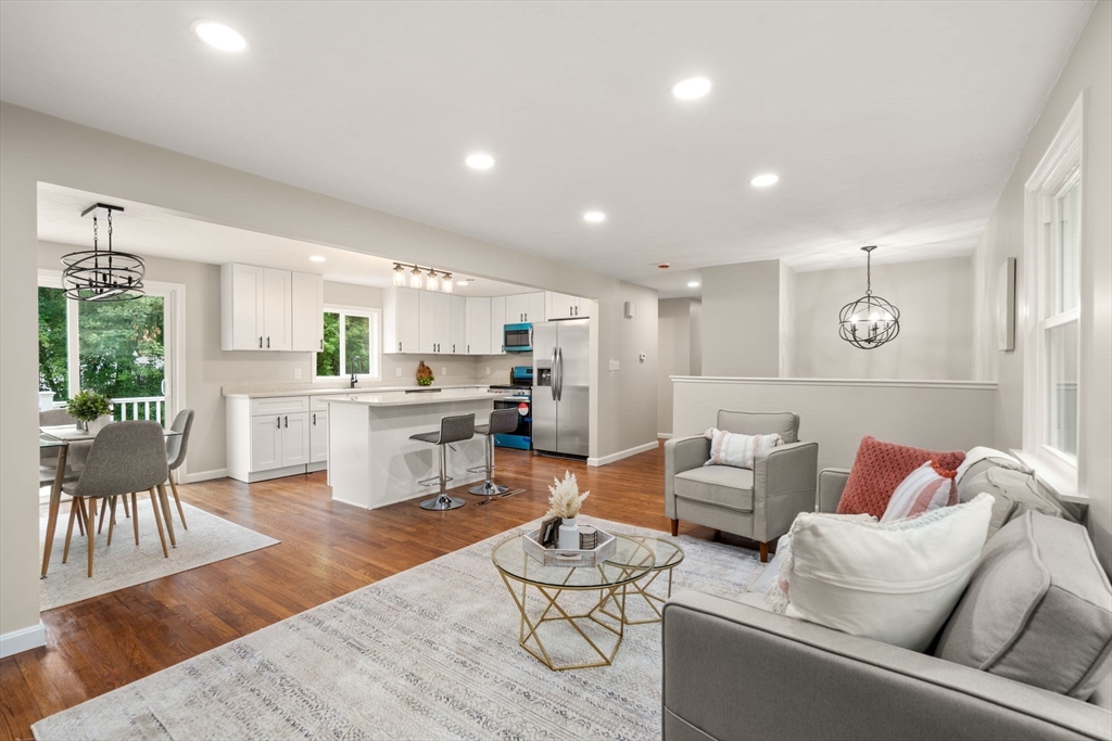 7 Prescott Road Sutton, MA 01588 - Photo 10 of 34 a living room with furniture and kitchen view