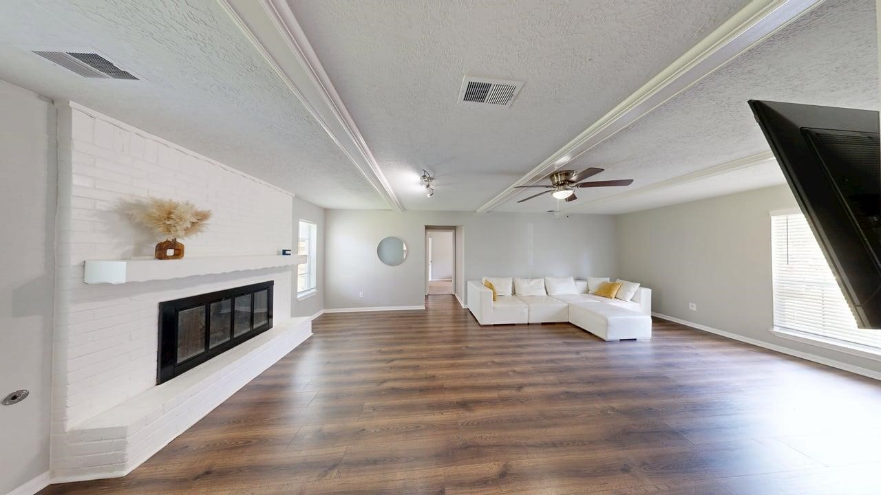619 Cotter Drive Spring, TX 77373 - Photo 12 of 50 a living room with furniture and a fireplace