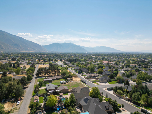 687 South 2080th Street East Springville, UT 84663 - Photo 82 of 149 Expansive neighborhood setting with mature trees and mountain backdrops
