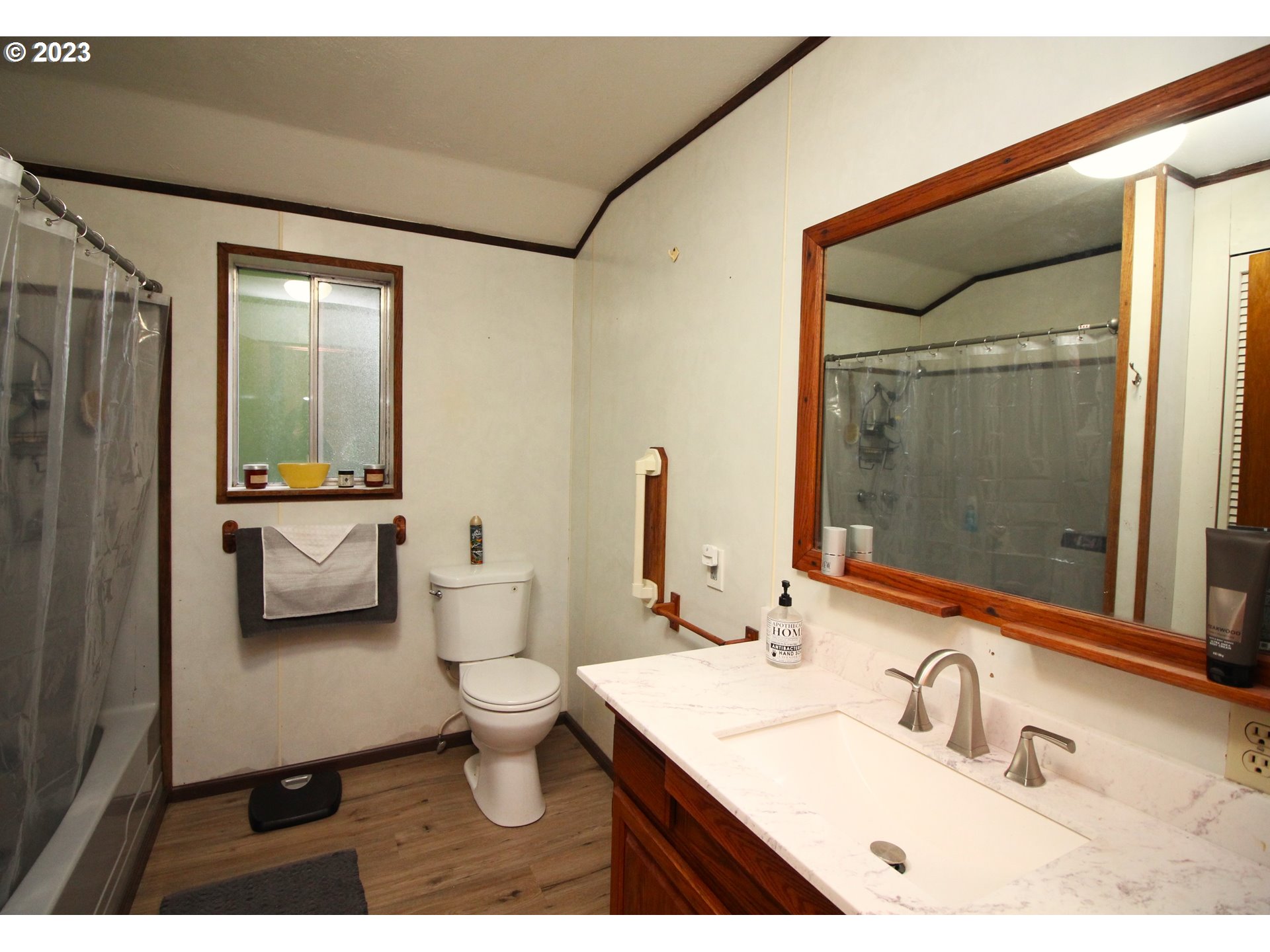 32962 Hillside Acres Road Gold Beach, OR 97444 - Photo 11 of 28 a bathroom with a sink a toilet and shower