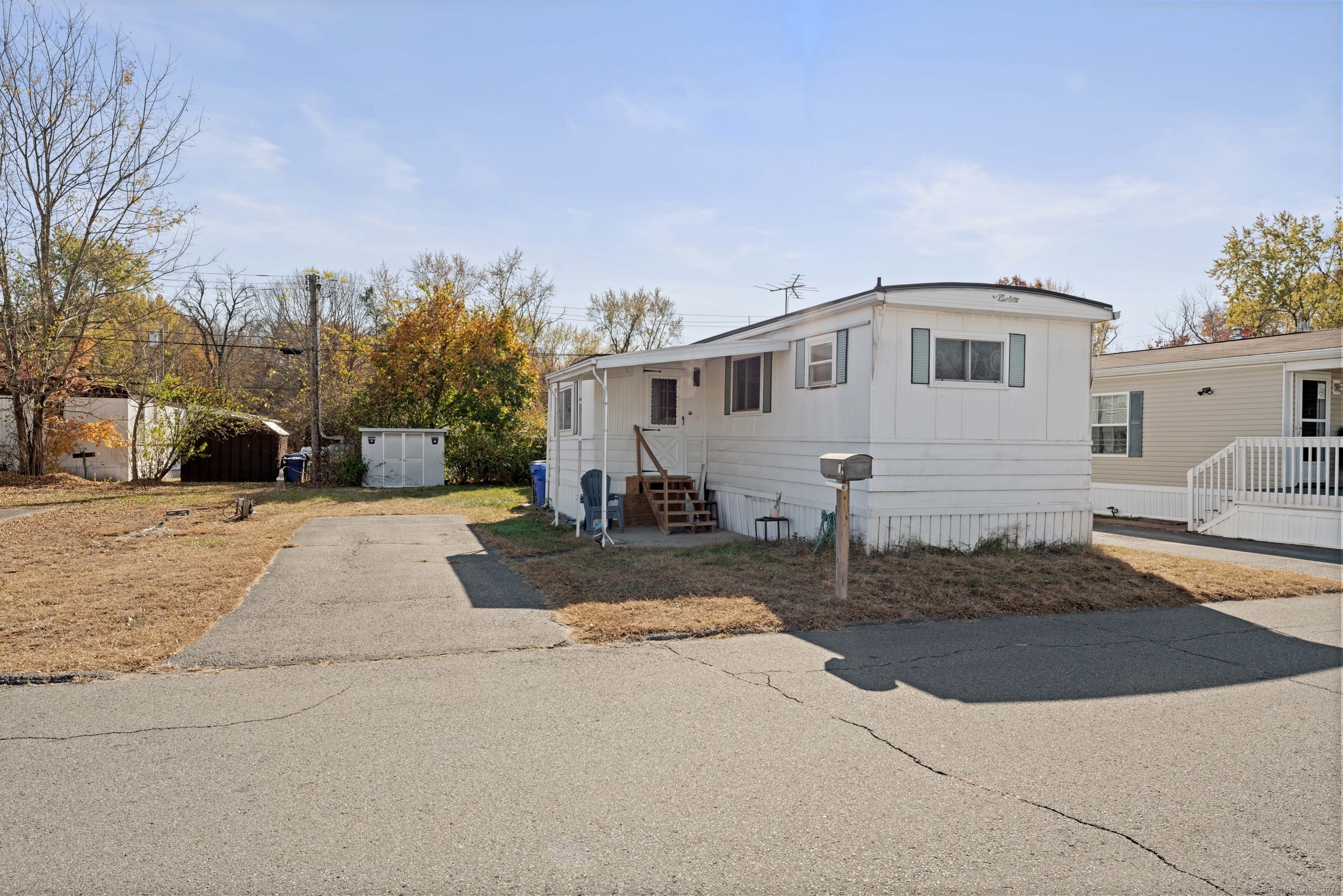 a front view of a house with yard