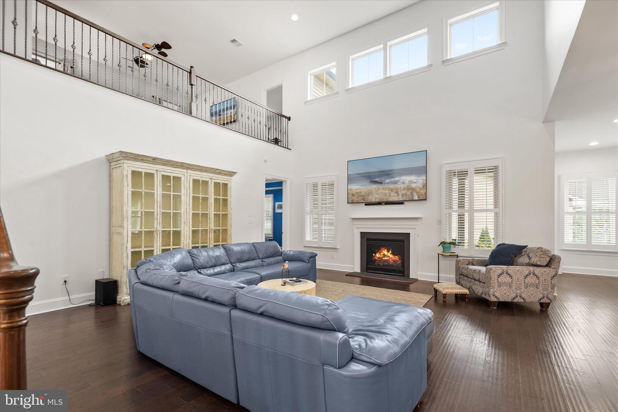 34749 Timber Court Dagsboro, DE 19939 - Photo 19 of 60 a living room with furniture large window and fireplace