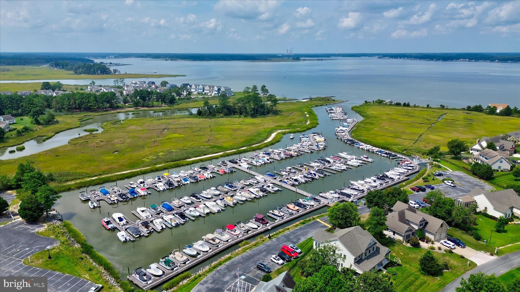 34749 Timber Court Dagsboro, DE 19939 - Photo 3 of 60 a view of a city and an ocean view