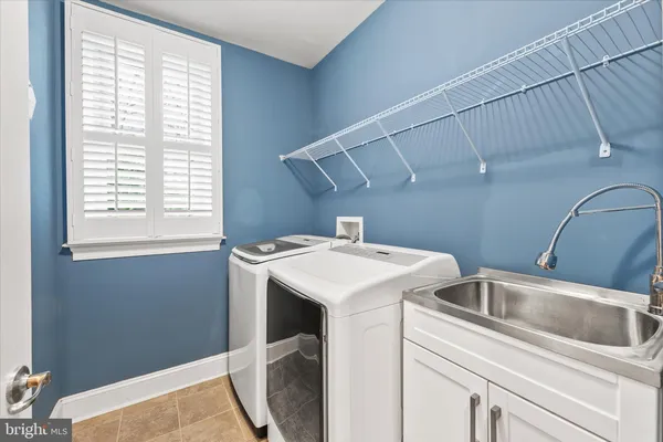 a bedroom with a bed and a table with table