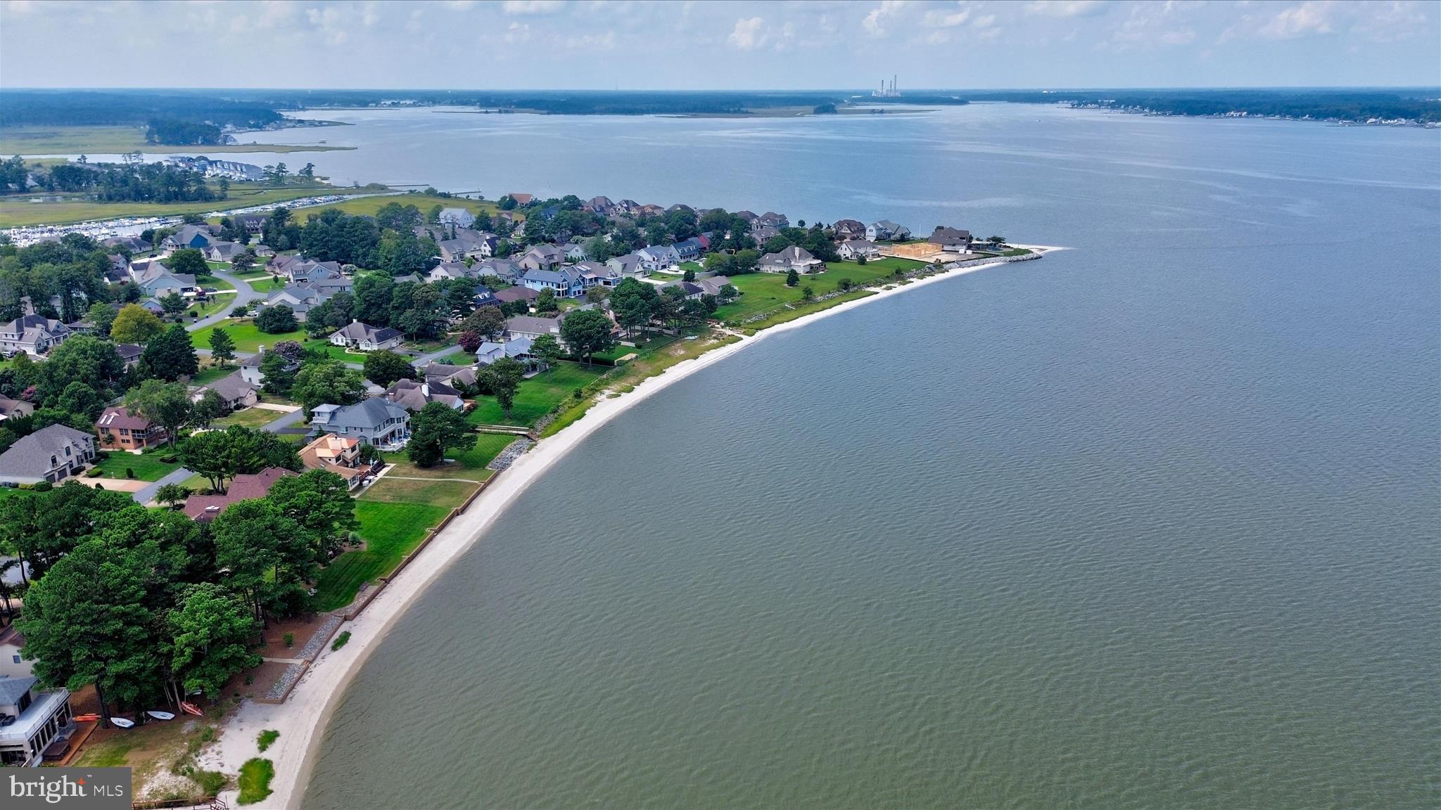 34749 Timber Court Dagsboro, DE 19939 - Photo 4 of 60 a view of a lake with a city view