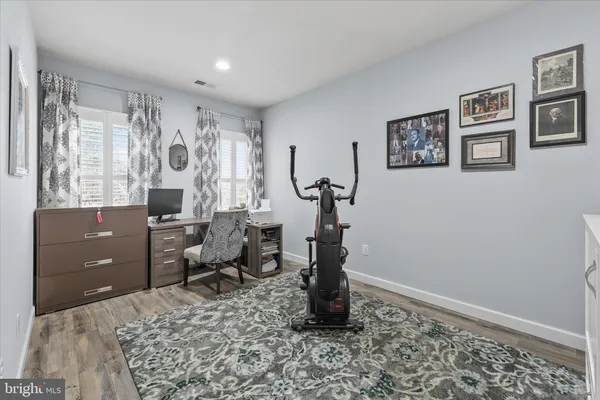 a view of a house with a yard and garage