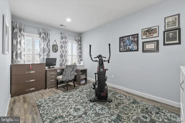 a view of a house with a yard and garage