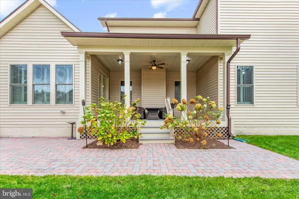 a view of a chairs and table in the terrace